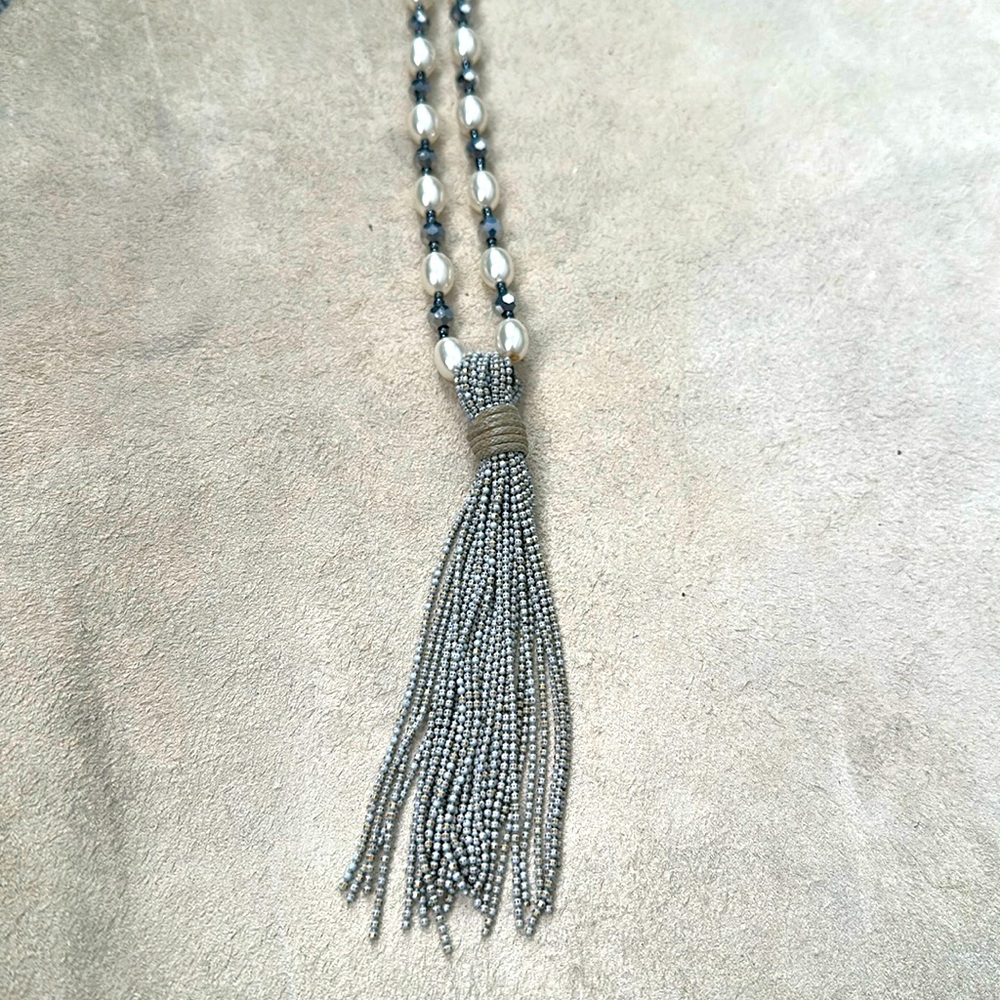 Long necklace.
